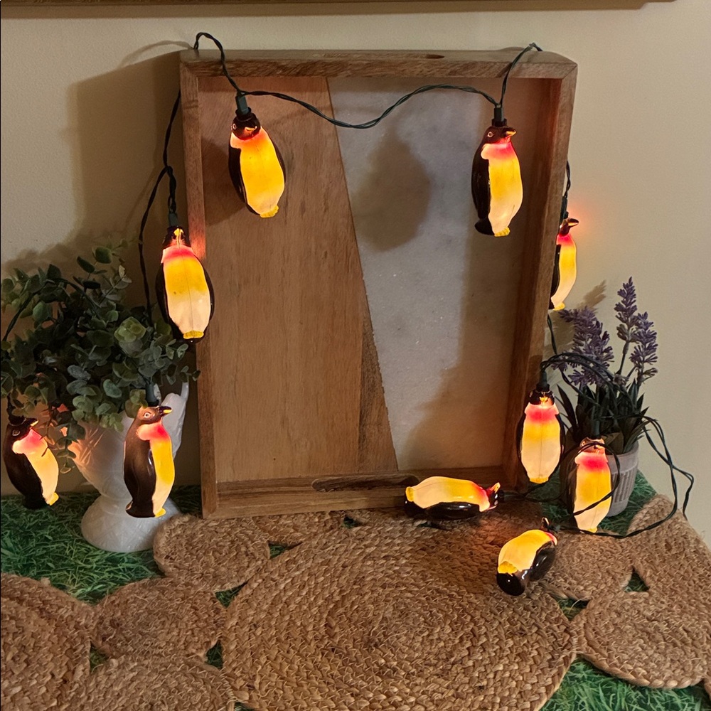 Light Up Emperor Penguin String Party Lights, one set with 10 lights.